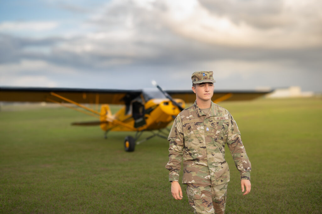 Home Sunset senior session taken at Lakeland Linder Airport in Polk County Florida